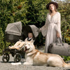 Mom with children in the Mountain Buggy Duet Luxury Herringbone Double Stroller