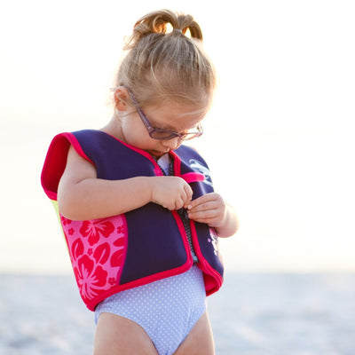 Little girl wearing Konfidence Swim Jacket