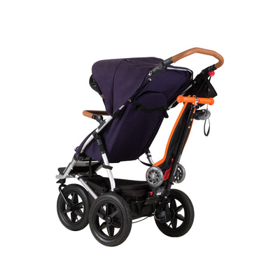 Mountain Buggy Freerider Stroller Board/Scooter in Orange attached to stroller