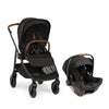 Nuna SWIV™ + PIPA™ Urbn Travel System in Caviar