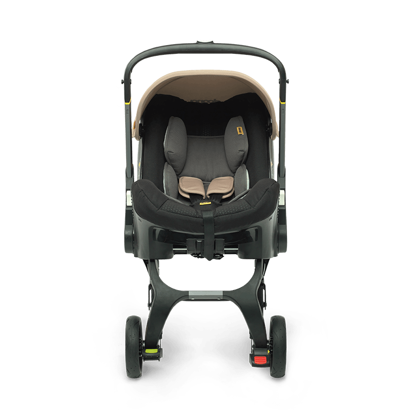 Doona™ Infant Car Seat/Stroller + Base in Sahara Sand