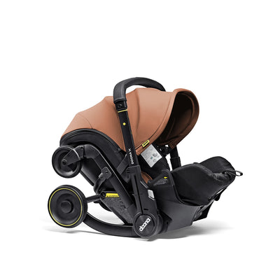 Doona™ X Infant Car Seat & Stroller + Latch Base in Terracotta