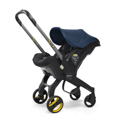 Doona™ Infant Car Seat/Stroller + Base in Deep Blue