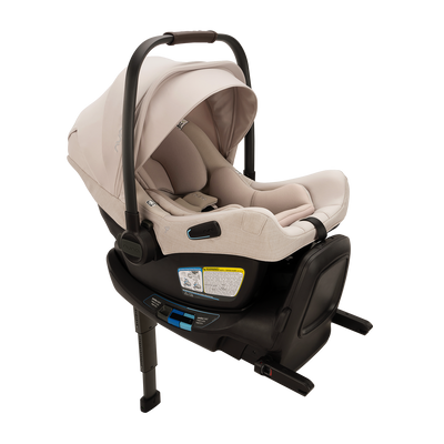 Nuna PIPA™ Aire RX Infant Car Seat + RELX Base in Biscotti