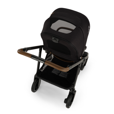 Nuna SWIV™ + PIPA™ Urbn Travel System in Caviar
