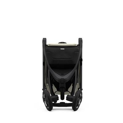 Thule Spring 2 Compact Stroller in Soft Beige folded