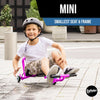 Child riding a pink scooter with 'EzyRoller' branding on a sidewalk.