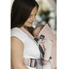 Mon wearing the BABYBJÖRN Baby Carrier Mini in pearly pink mesh