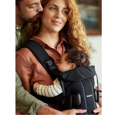 Mom wearing the BABYBJÖRN Baby Carrier One