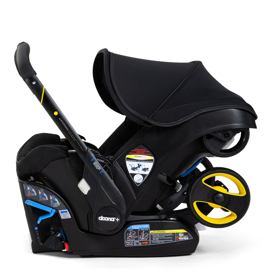 Doona™ Midnight Infant Car Seat/Stroller + Base - Little Folks NYC Doona™ Midnight Infant Car Seat/Stroller + Base - Little Folks NYC