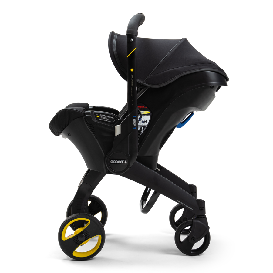 Doona™ Midnight Infant Car Seat/Stroller + Base - Little Folks NYC Doona™ Midnight Infant Car Seat/Stroller + Base - Little Folks NYC