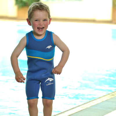 Boy at the pool wearting Konfidence Warma Wetsuit