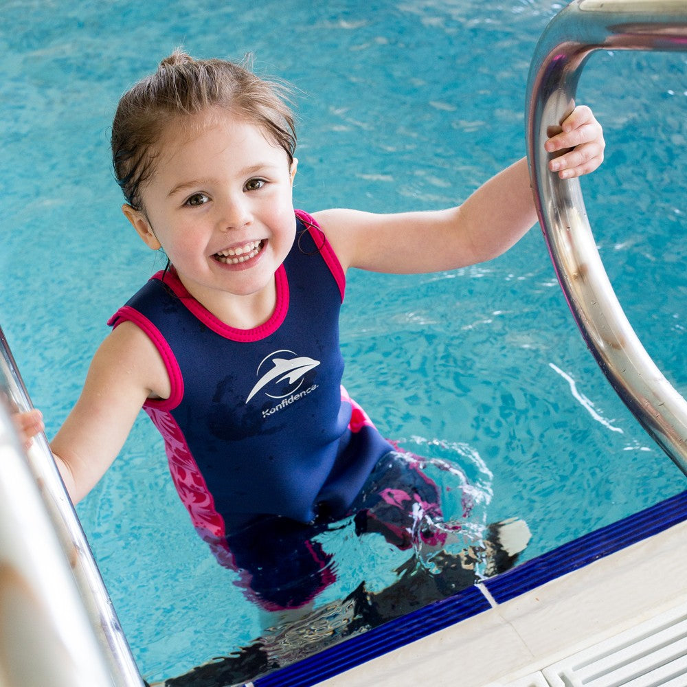 Girl at the pool wearing Konfidence Warma Wetsuit