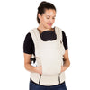 Mom wearing Mountain Buggy Juno Baby Carrier in Sand