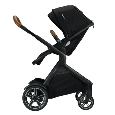 Nuna DEMI™ Grow Stroller + Adapters + Rain Cover + Magnetic Buckle in Caviar with seat reversed