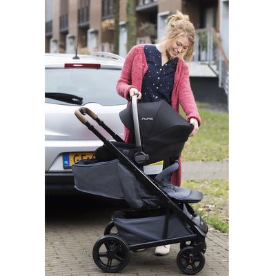 Mom with Nuna Tavo Travel System 2019