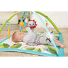 Baby playing on the Tiny Love Meadow Days™ Sunny Day Gymini®