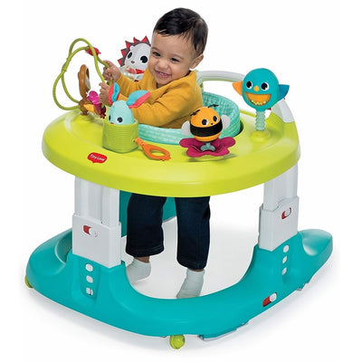 Baby playing in the Tiny Love Meadow Days™ 4-in-1 Here I Grow Mobile Activity Center